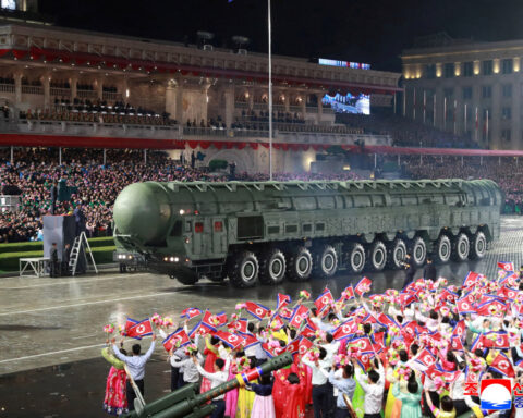 North Korea holds military parade, shows off new intercontinental missile