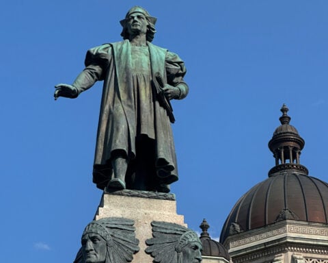 A sacred lake, a Columbus statue, and an Indigenous people's long struggle for land