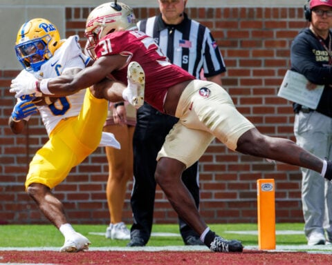 Mason Heintschel throws for 321 yards, two TDs to Desmond Reid in Pitt's upset of No. 25 Florida St.