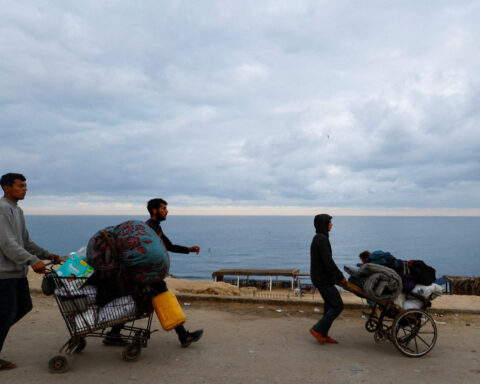 Gazans stream back home as Israel-Hamas ceasefire holds