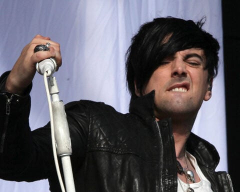UK police arrest 2 in stabbing death of former Lostprophets singer in prison