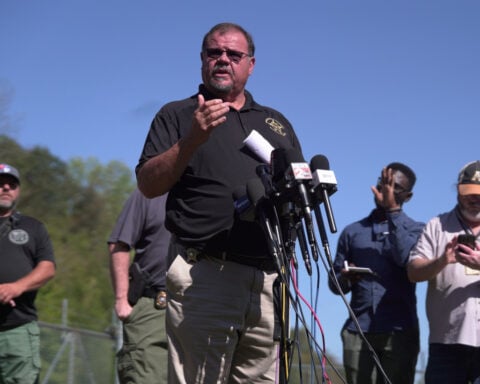 Investigators tread carefully at charred Tennessee explosives plant as families of 16 blast victims learn of their loss