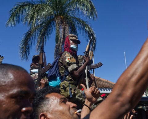 Madagascar's president says a coup is underway after soldiers joined anti-government demonstrations