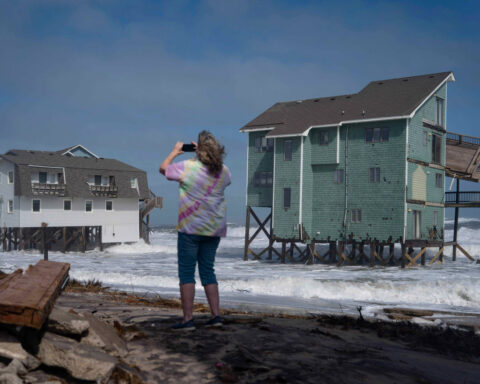 New Jersey declares emergency as nor'easter approaches, while Alaska flooding carries away homes
