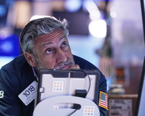 Wall Street veers upward after Trump softens his criticism of China