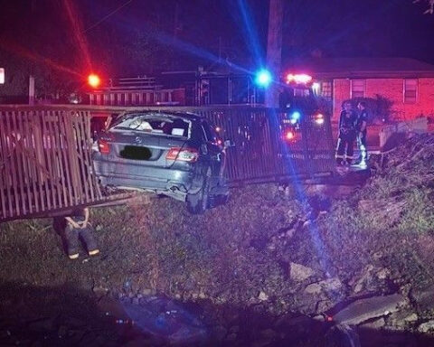 Driver arrested after fiery crash into pedestrian bridge