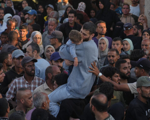 The Latest: Living hostages and Palestinian prisoners freed as Trump tours region