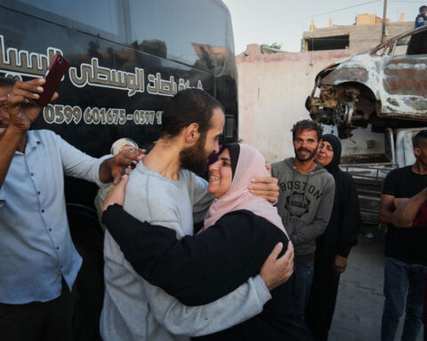 Tears and cheers in West Bank and Gaza as nearly 2,000 Palestinians are released from Israeli prisons