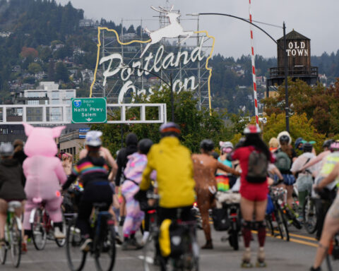 Naked bike riders demonstrate against federal troops in 'quintessentially Portland' protest