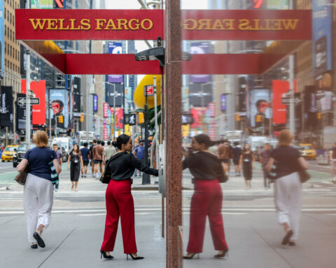 Wells Fargo tops profit estimates, raises return target after asset cap lifted