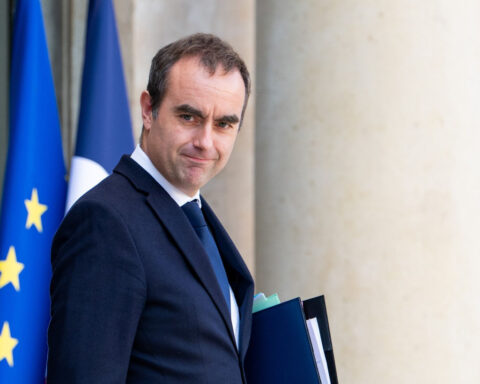 Socialists throw French prime minister a temporary lifeline