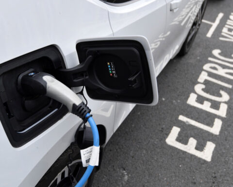 Global EV sales hit record 2.1 million in September, research firm says