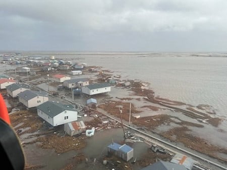 Officials airlift evacuees to safety after the remnants of Typhoon Halong devastate Alaska villages