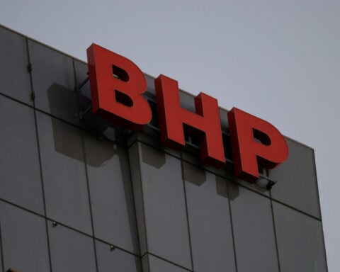 BHP's Slattery says Australia must cut red tape, power costs, to compete