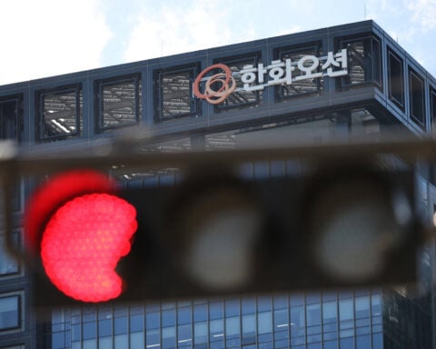 China's sanctions against US-linked Hanwha units seen as warning gesture, analysts say