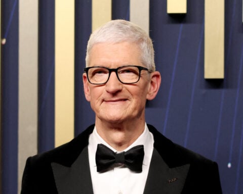 Braving Trump, Apple's Tim Cook promises to boost China investment