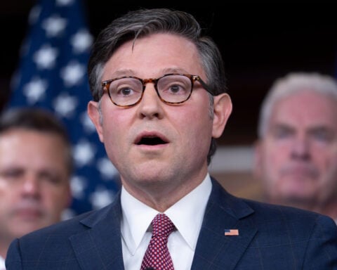 Judge temporarily blocks the Trump administration from firing workers during the government shutdown