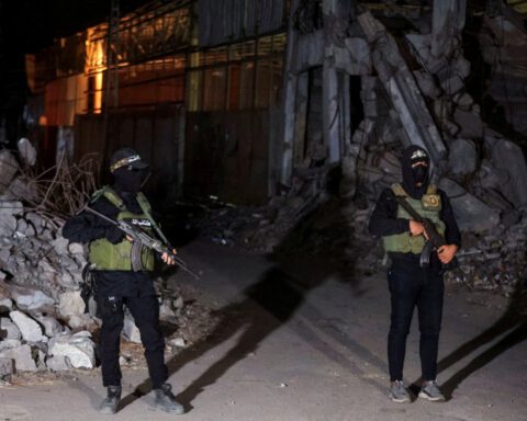 Aid trucks roll into Gaza as Hamas hands over more hostage bodies