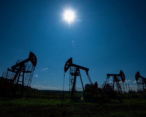 Oil drops 1%, settles at 5-month lows as Trump-Putin summit looms