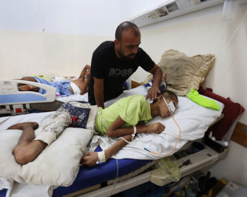 Gaza father hopes reopening of medical corridor can save his injured son