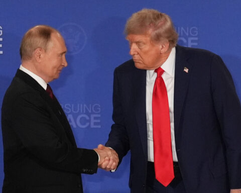 The Latest: Indicted ex-Trump adviser John Bolton accused of sharing 1K+ docs on government info