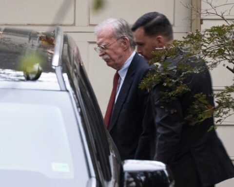 The Latest: Trump says he has commuted the sentence of former US Rep. George Santos in fraud case