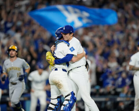 Shohei Ohtani hits 3 homers and strikes out 10 in Dodgers' clinching 5-1 NLCS win over Brewers