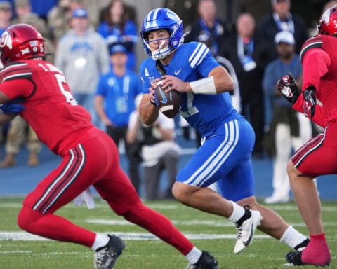 No. 15 BYU edges No. 23 Utah 24-21 for third straight Holy War victory