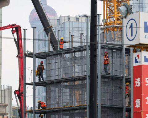 China's Q3 GDP growth set to slow to one-year low as property slump, trade tensions sap demand