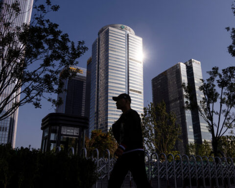 China's economy slows as trade war, weak demand highlight structural risks