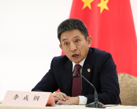 China removes top trade negotiator from former WTO post