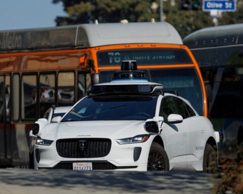US probes Alphabet unit Waymo robotaxis over school bus safety