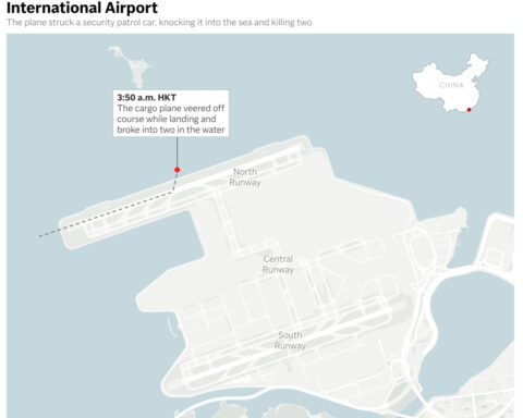 A cargo aircraft skids off a Hong Kong runway into the sea, killing 2 airport workers