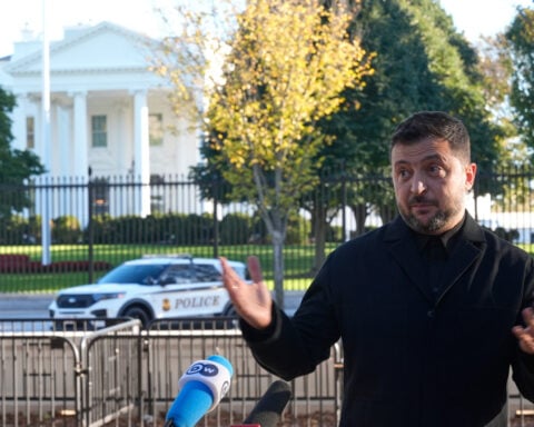 The Latest: Trump signs $8.5 billion rare earths deal with Australian prime minister