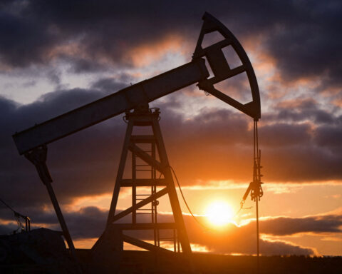 Oil settles higher as investors focus on supply signals