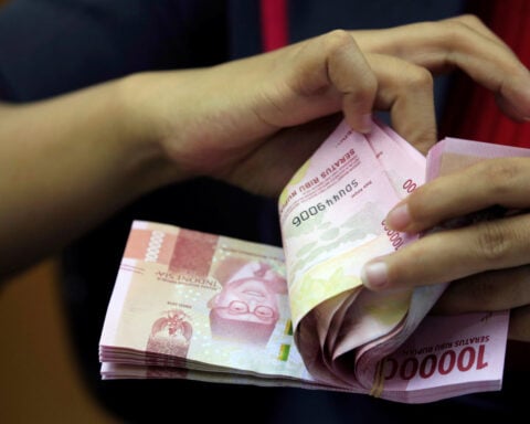 Asian bond outflows in September hit 3-1/2-year high on slowdown concerns