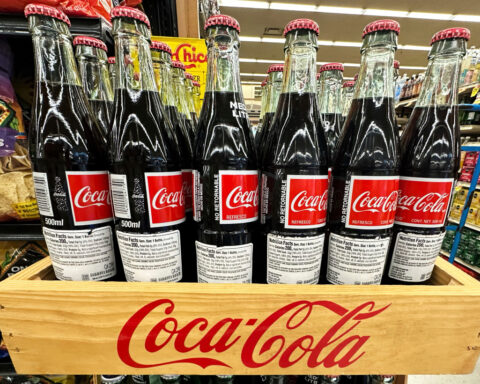 Premium drinks and mini cans help Coca-Cola boost third quarter results despite tepid demand