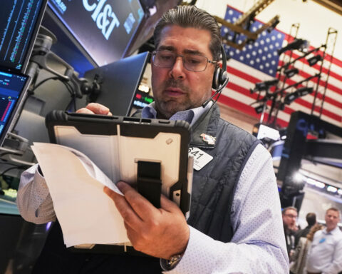 The Dow hits a record as 3M, Coca-Cola and other big US stocks climb