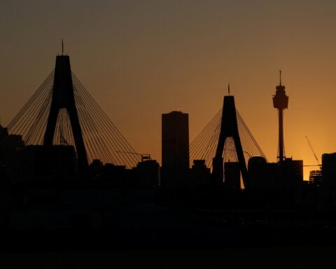 Fierce winds stoke fires, bring extreme heat to Australia and New Zealand