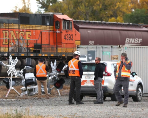 Rail conductor who was struck by a train and killed is identified as a Montana man