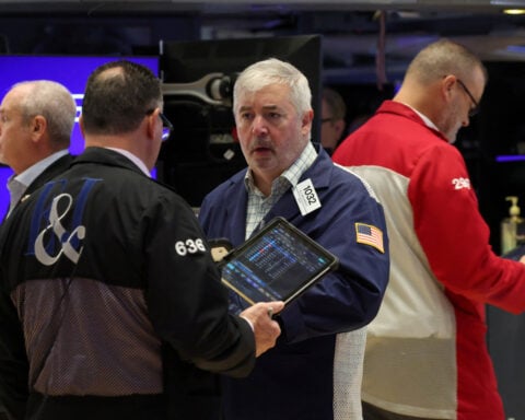 Stocks ease as Netflix falls; gold extends Tuesday's fall 