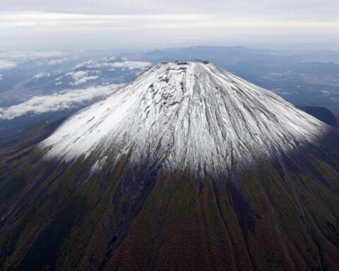 Japan's Mount Fuji sees snow for first time this winter, 21 days later than usual