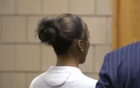 One sister appears in court on charges related to crash that killed 3 high school football players