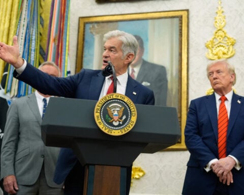 Some furloughed workers will return to manage health insurance open enrollment as shutdown drags on