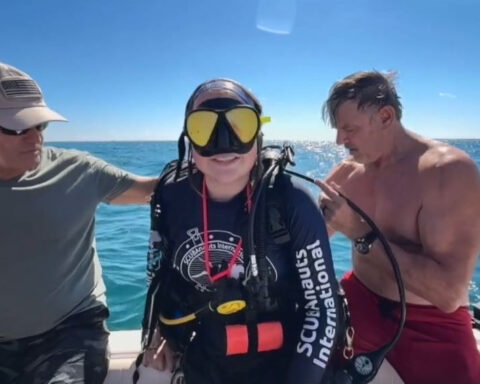 Teens and vets team up to dive, explore and preserve
