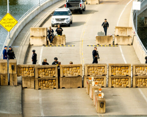 Shots fired, driver hurt and held after truck rams into Coast Guard base in California