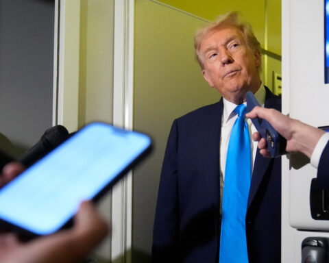 Trump travels to Asia and a meeting with China's Xi as the US government shutdown drags on