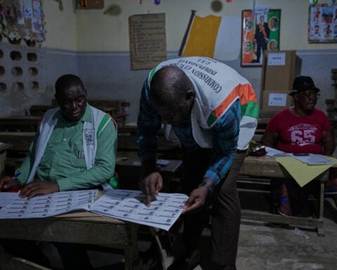 Ivory Coast counts votes in key election with incumbent Ouattara predicted to win fourth term
