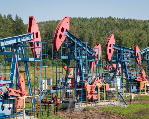 Oil settles lower as OPEC plans to increase oil output