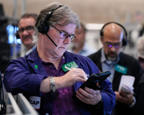 Wall Street rallies to more records as gold's price slumps again